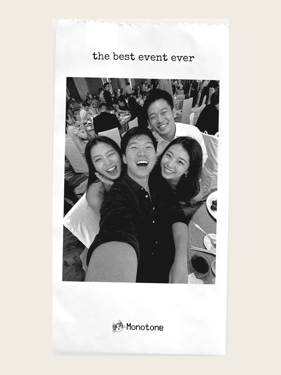 A sample Monotone photo receipt showing four friends taking a selfie at a wedding banquet, printed in black and white.